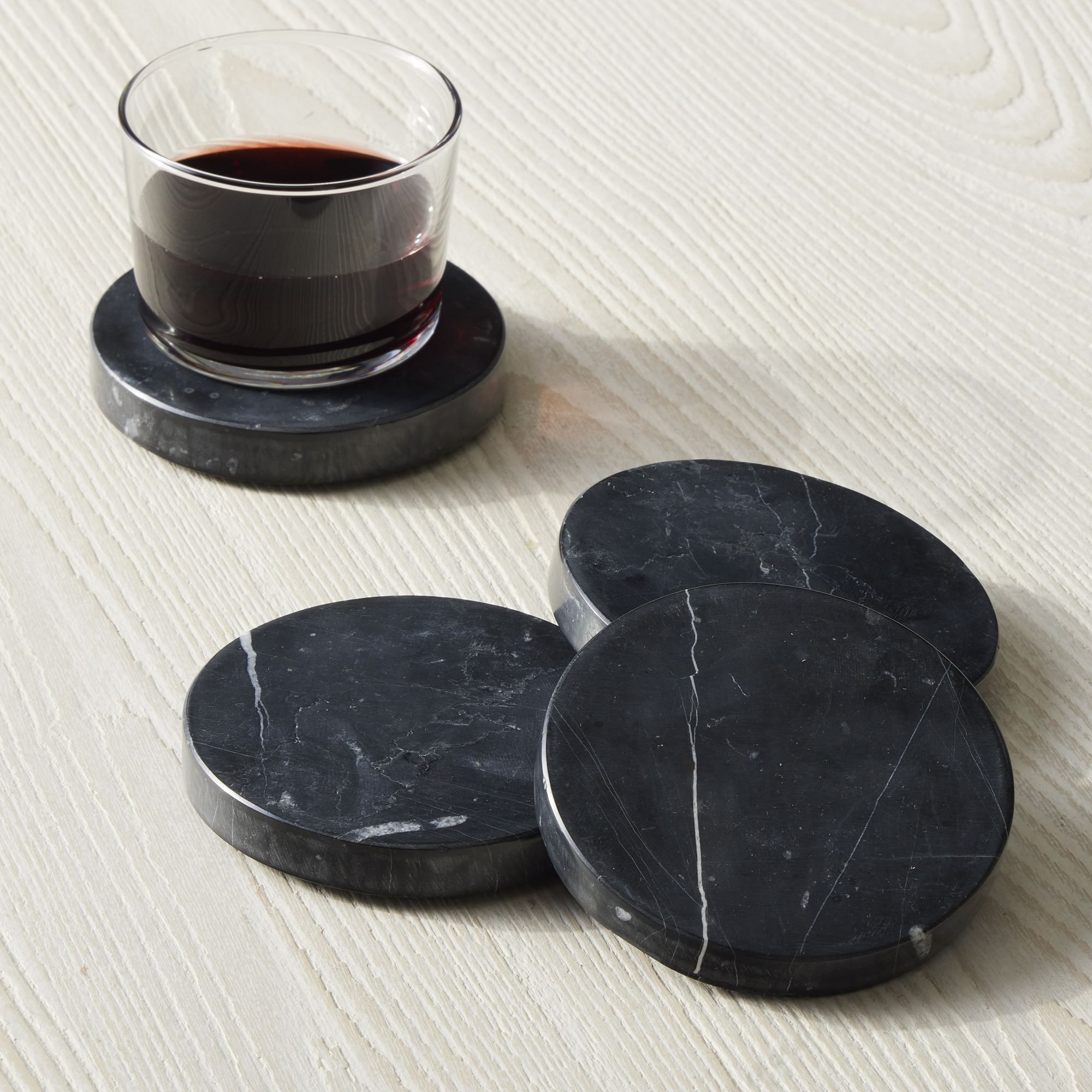 /uploads/black_marble_round_coasters_set_of_4_xl_83d6b0bd06.jpg